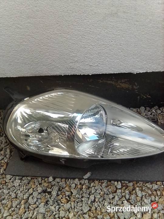 Reflektor przedni Fiat Grande lewa