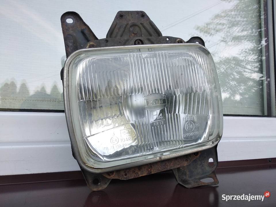 Nissan Navara D21 King Cab lampa przednia lewa Sieradz