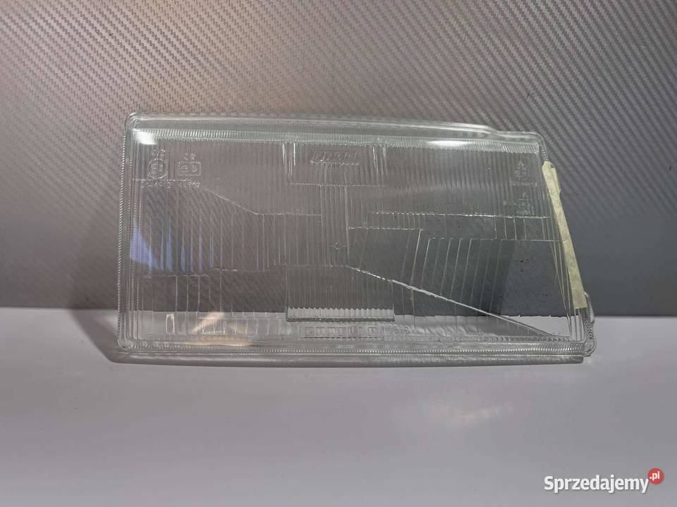 FIAT UNO PRAWY KLOSZ ORYGINAŁ CARELLO 1989 Lampy przednie Ostroróg