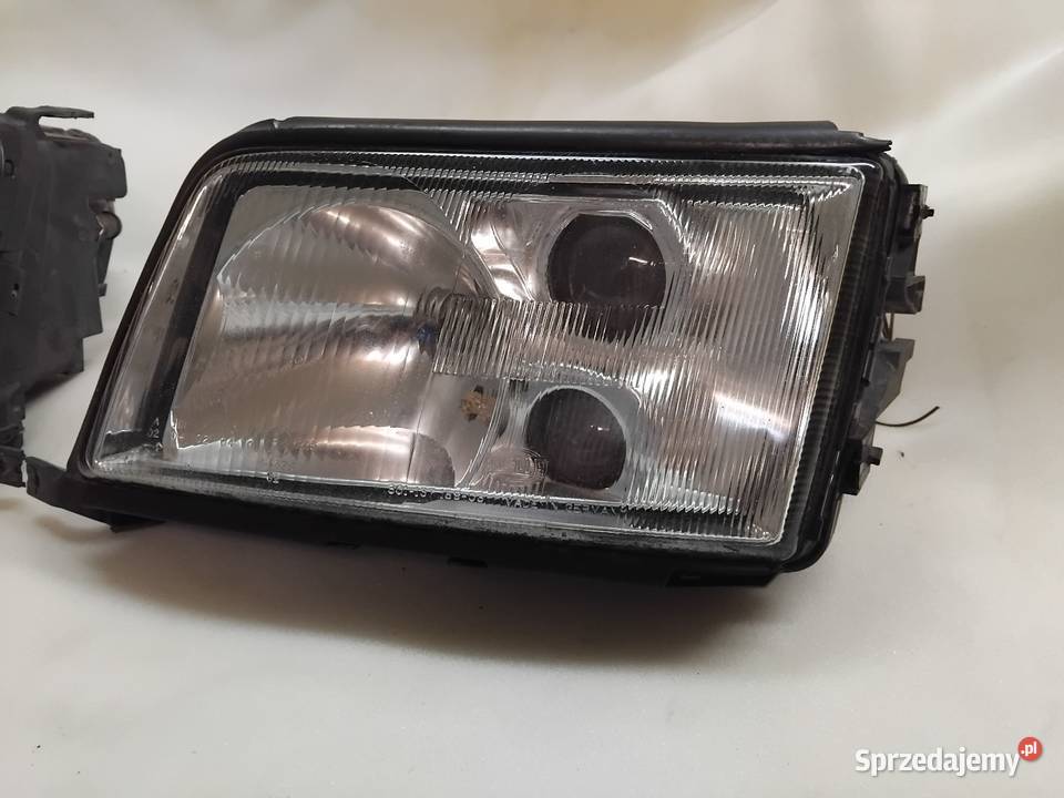 Lampy przód soczewka Audi 100 S4 C4 Hella Grodków
