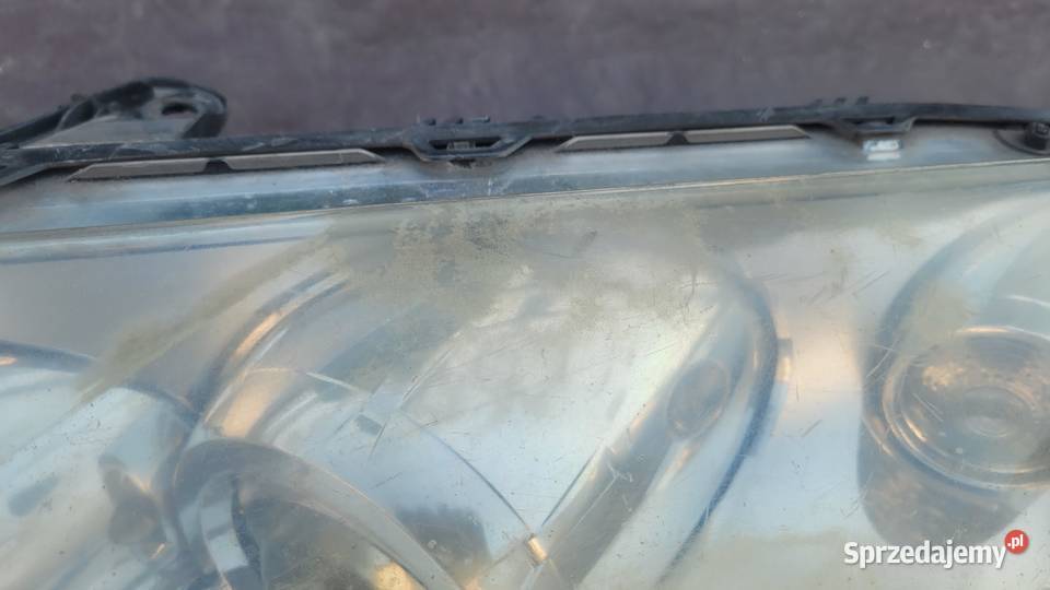 RENAULT LAGUNA III 0710 REFLEKTOR LEWY LAMPA Ruda Śląska