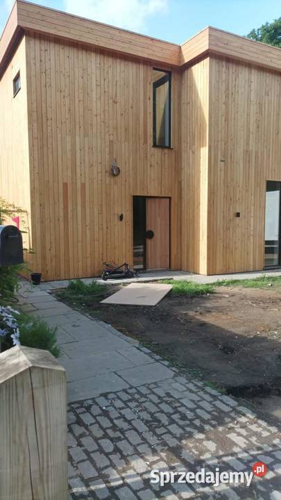 Aluminiowe drzwi z drewnianym panelem Nowy Sącz