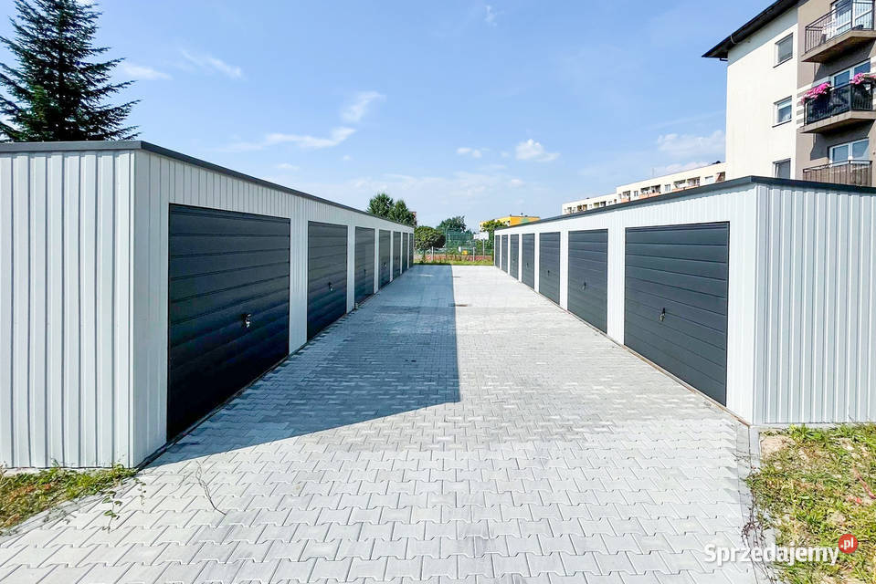 Rząd garaży 28x55m 7x bramy uchylne dach spad w