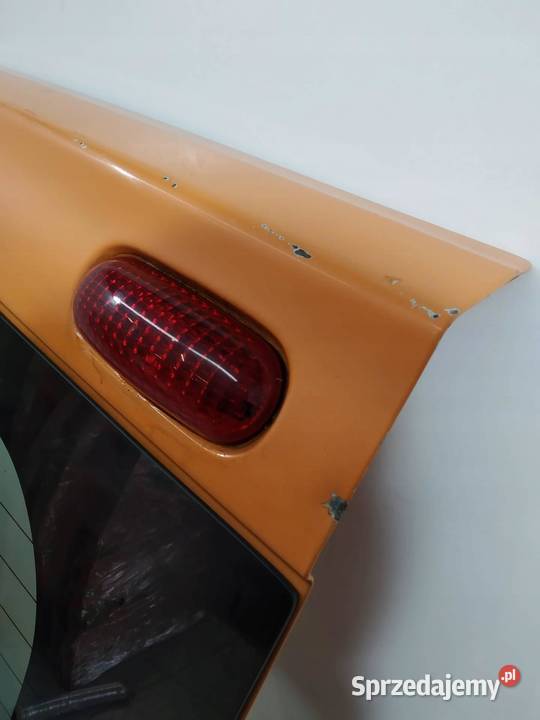 DRZWI LEWE TYŁ SKRZYDEŁKO POMARAŃCZOWE Opel