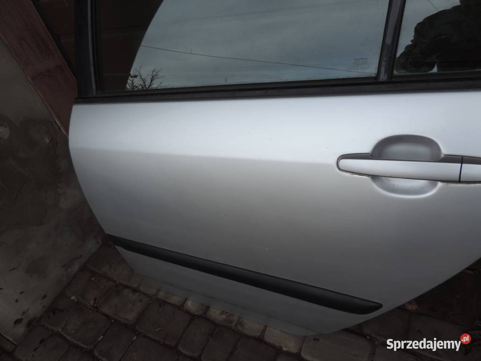 TOYOTA COROLLA E12 SEDAN DRZWI LEWY TYŁ 199