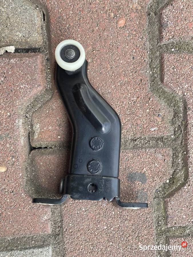 Zawias rolka tył lewy Ford Grand C AM51 U25023 osobowe opolskie Tarnów Opolski