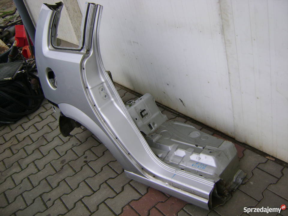 OPEL MERIVA BŁOTNIK TYLNY PRAWY BELKA GÓRNA Nowy Dwór Gdański