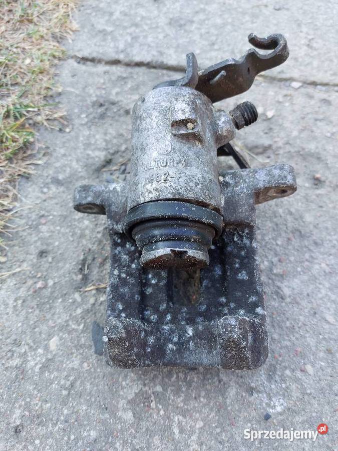 Vw Golf VI 20tdi tylny zacisk hamulcowy orginał Tyszowce