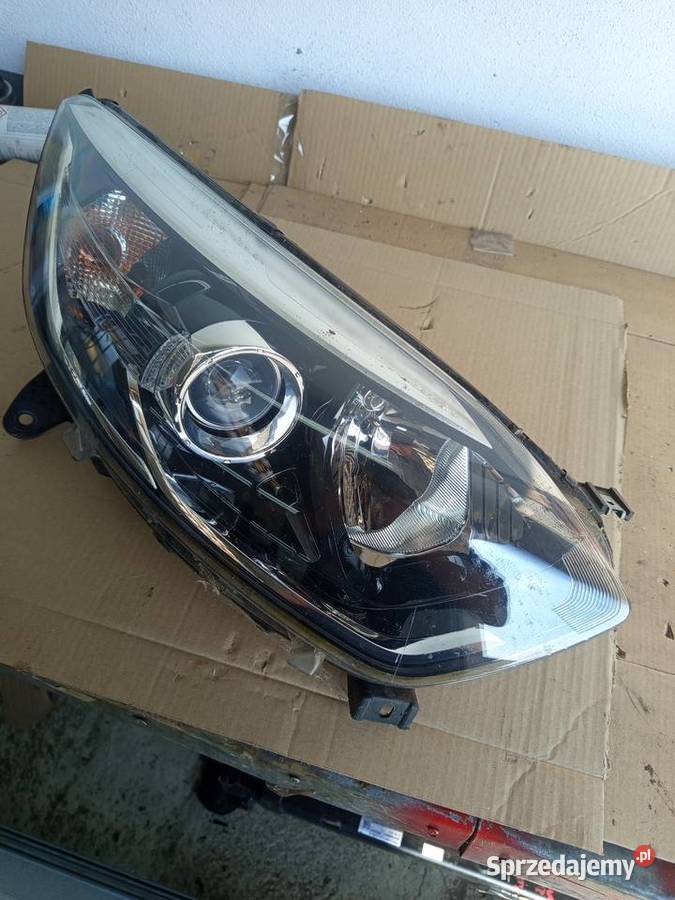 Reflektor prawy renault kaptur orginalny osobowe Lampy przednie Rzeszów sprzedam