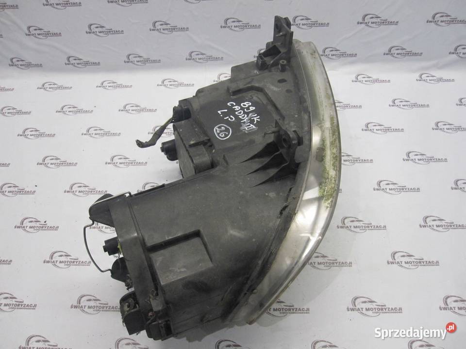 VOLKSWAGEN CADDY III 09r lampa lewy przód Części samochodowe