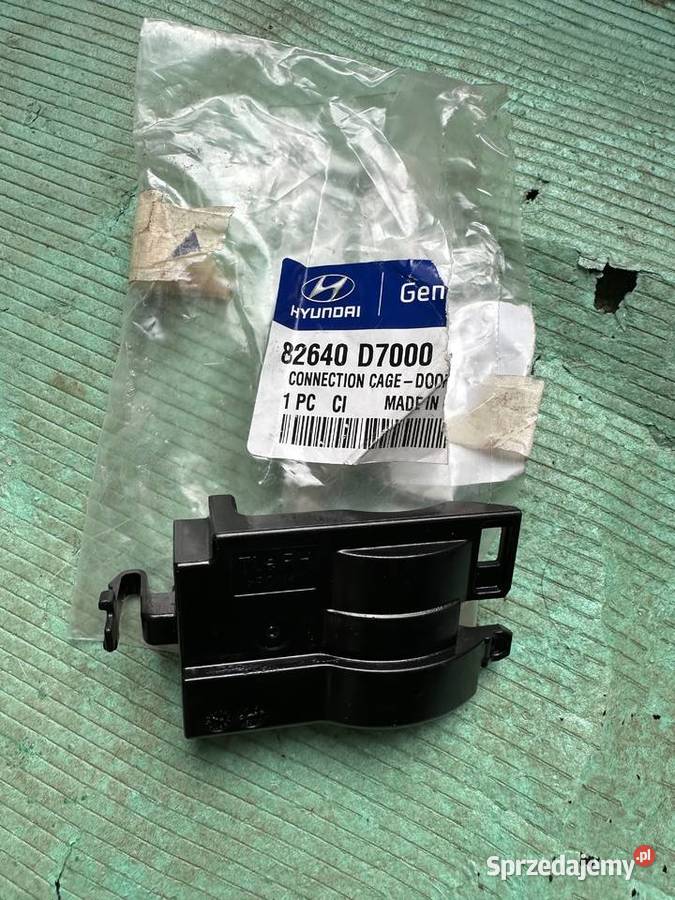 Hyundai TUCSON WSPORNIK KLAMKI PRZÓD PRAWEJ OE