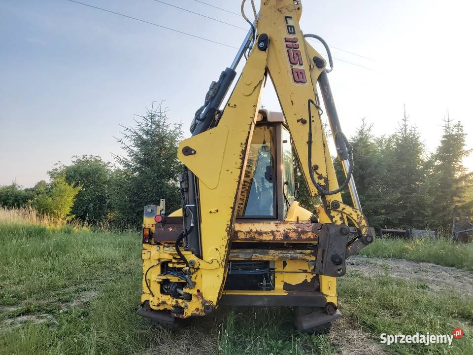 Koparko Ładowarka Holland LB 115B prod 2005 Jabłonowo Pomorskie