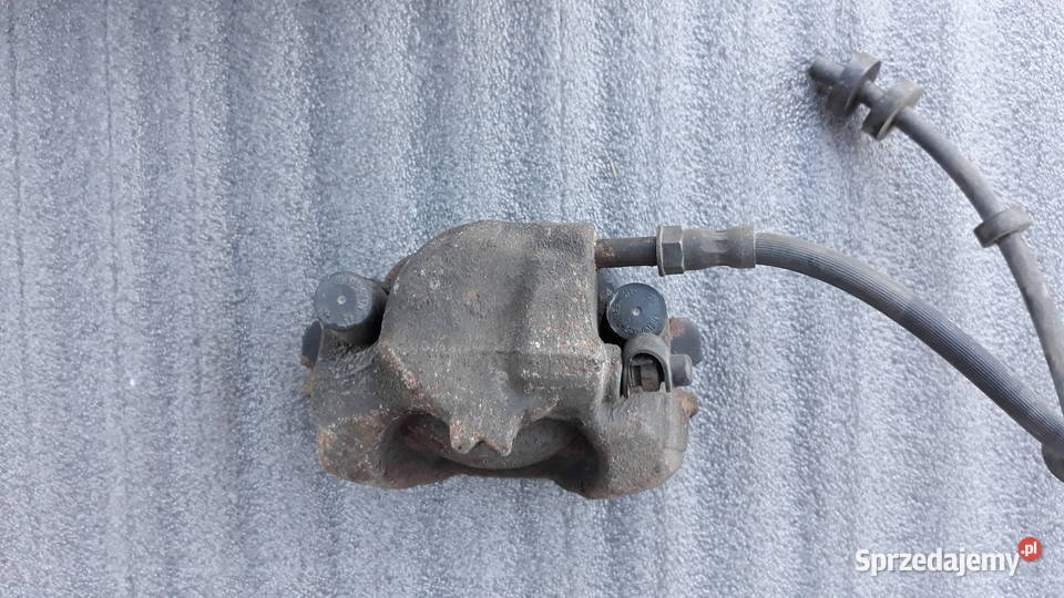 Audi A4 B8 8K Przedni zacisk hamulca prawy Bukownica