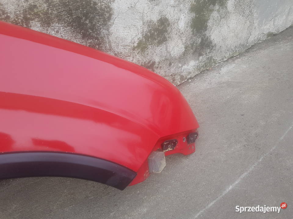 Suzuki Ignis MH 0410 błotnik przód przedni Legnica