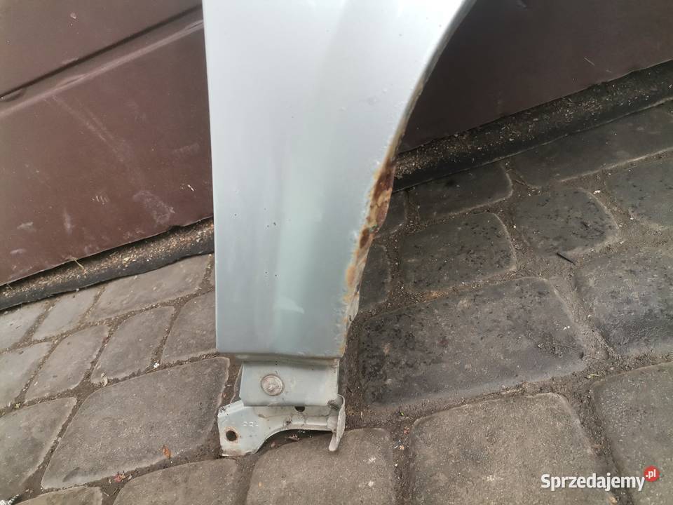 NISSAN PRIMERA P12 BŁOTNIK PRAWY PRZEDNI KY0G Nowy Sącz