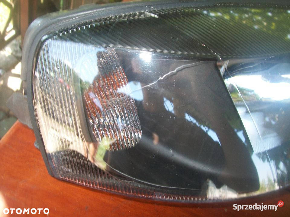 Lampa reflektor Opel ASTRA II TYC Europa Radom
