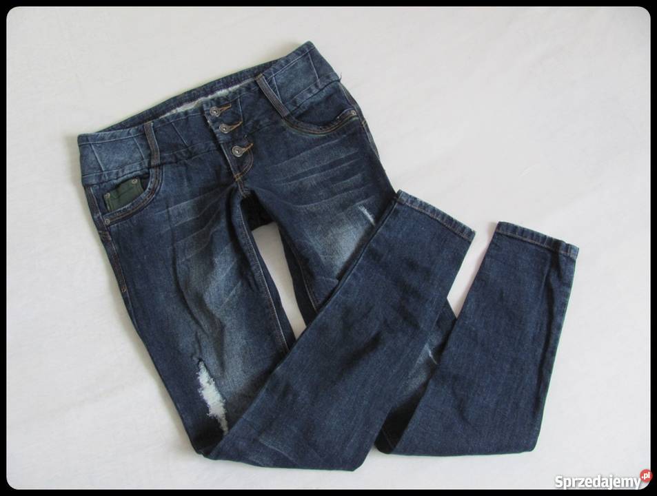 RAINBOW spodnie jeansowe z przetarciami 38 M Płock
