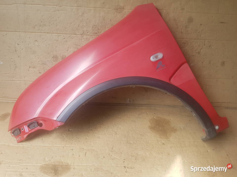 Suzuki Ignis MH 0410 błotnik przód przedni Legnica