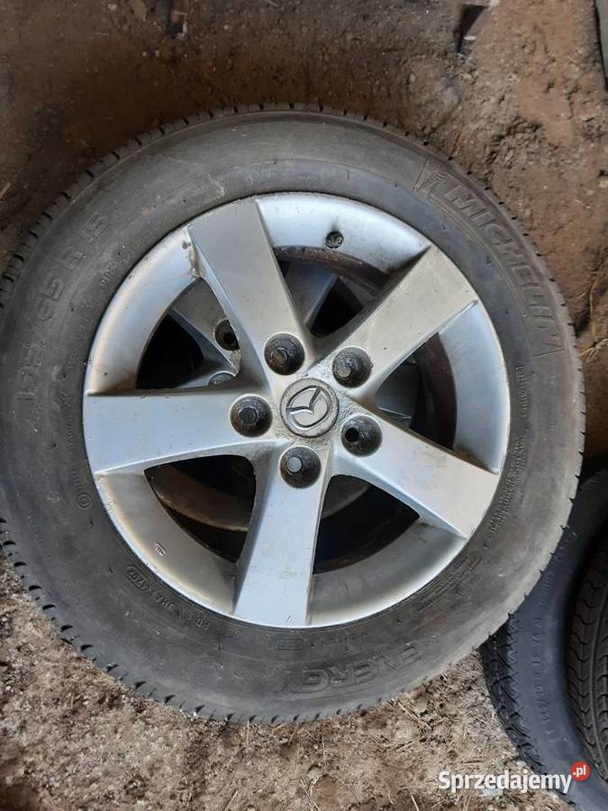 Mazda 3 Felga aluminiowa R15 z oponą 19565 Samochodowe Ksawerów sprzedam