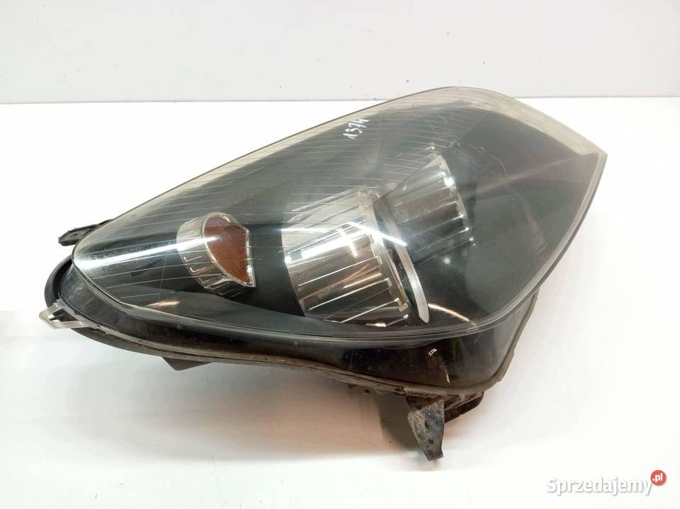 LAMPA PRZÓD PRAWA EU 24451033 Opel Astra III osobowe Lampy przednie świętokrzyskie