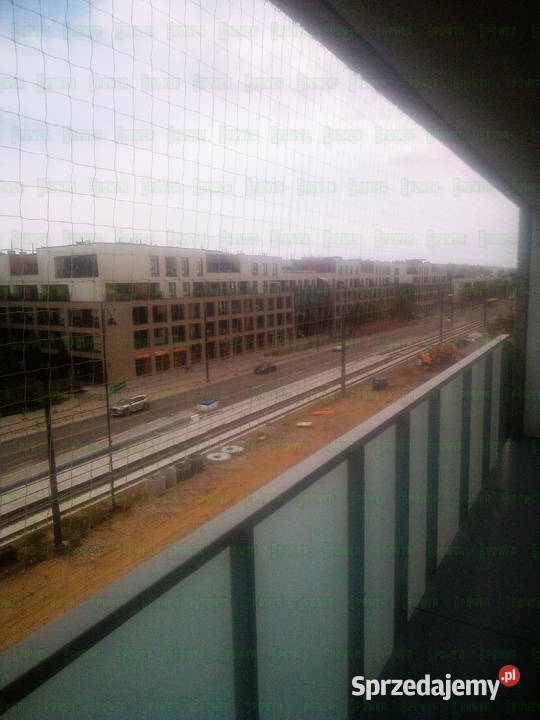 Siatka bezbarwna na balkon montaż Warszawa
