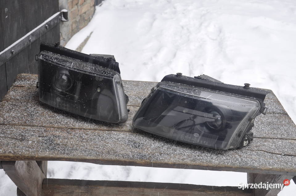 Reflektory Lampy Hella Black Passat B5 Xenon osobowe