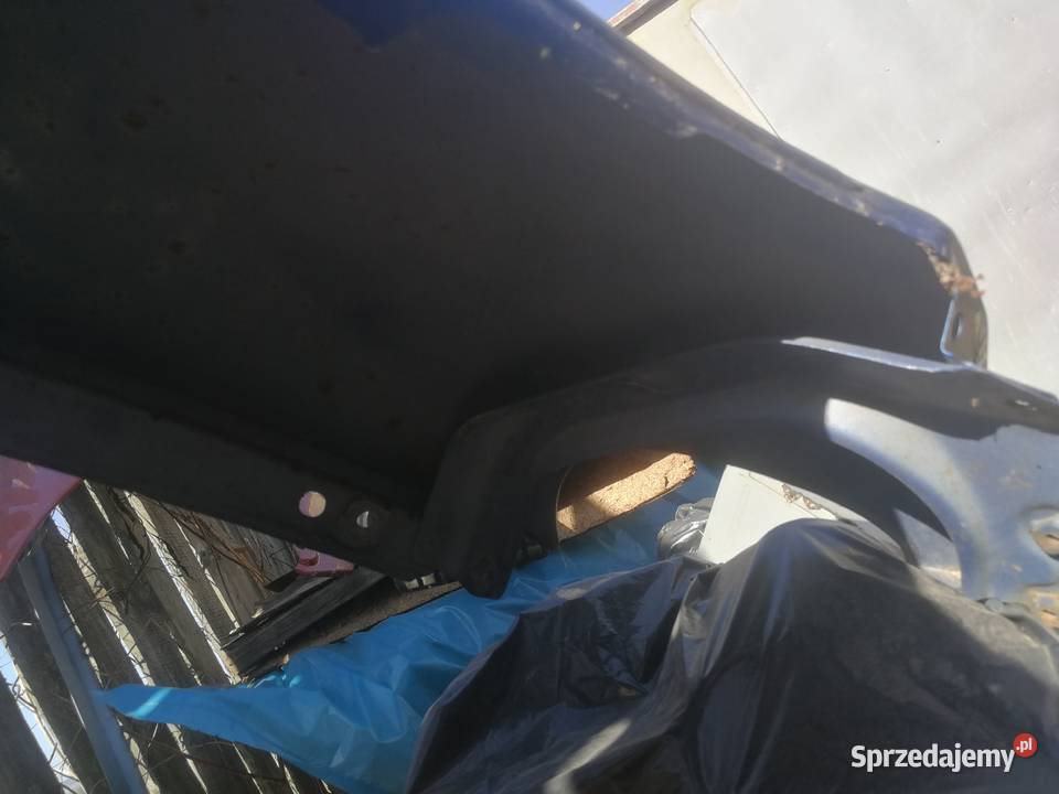 Toyota Yaris 2 2006 błotnik lewy Górno