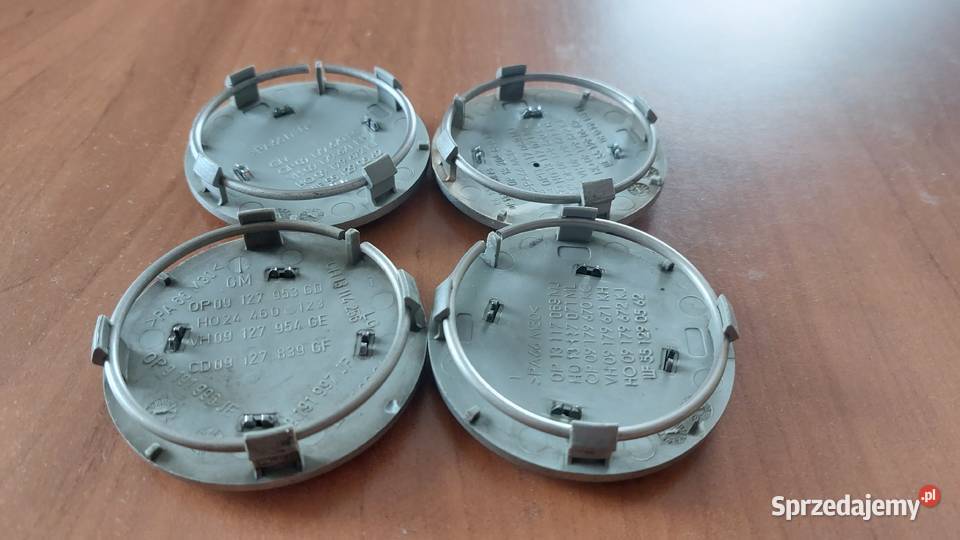 Dekielki OPEL 65 mm 09127953GD komplet 4 sztuki
