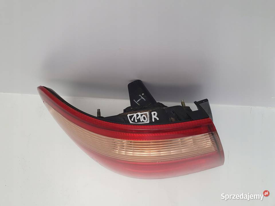 Nissan Almera N16 sedan TYLNA LAMPA LEWA lewy Rudka