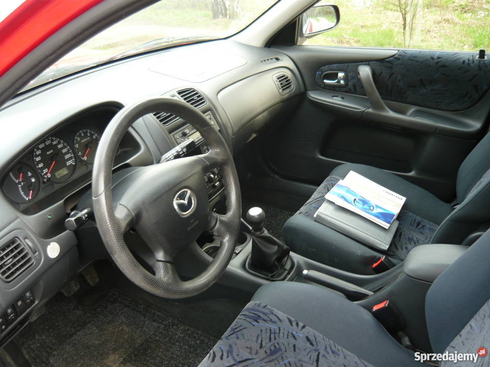 Mazda 323 15 Kombi Klima Elektryka Wspomaganie elektryczne szyby 323 sprzedam