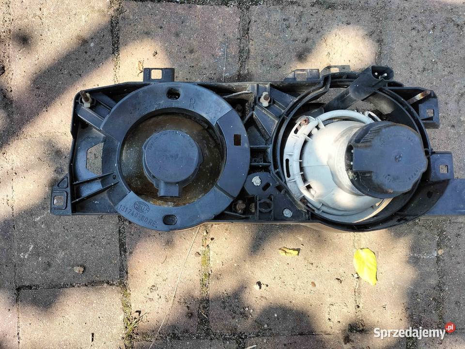Lampa przednia prawa BMW E34 POLIFT 1995 Lampy przednie Poręba