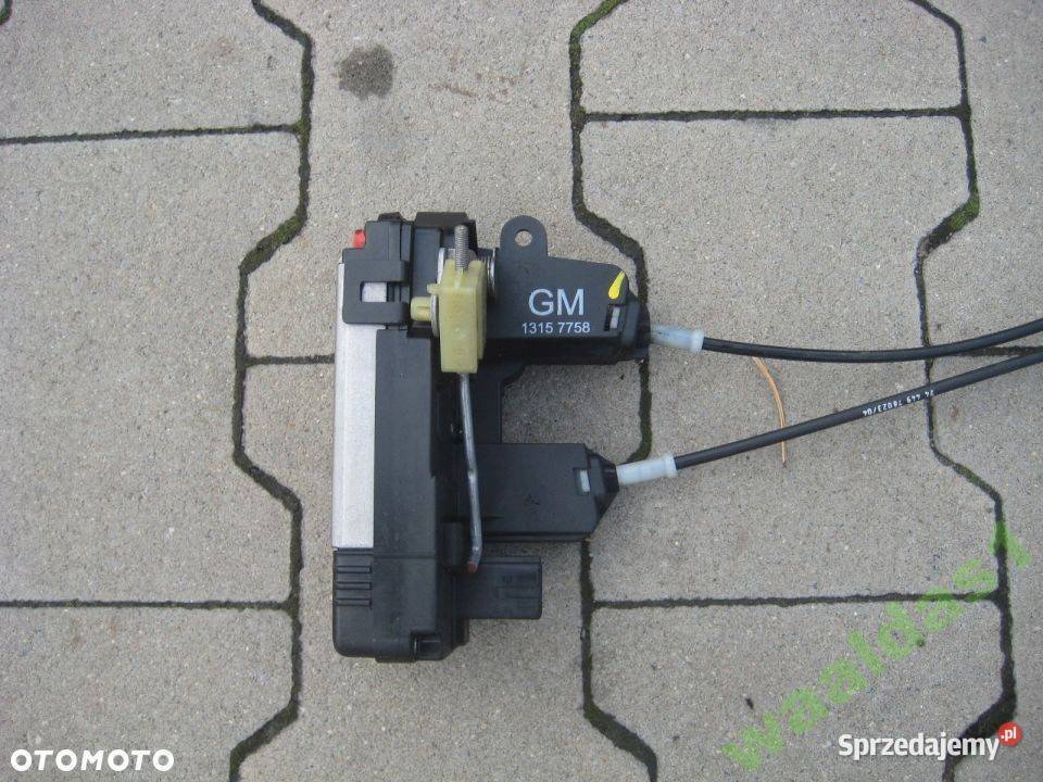 OPEL VECTRA C ZAMEK DRZWI TYŁ LEWY 13157758 gm osobowe Pozostałe Rakoniewice