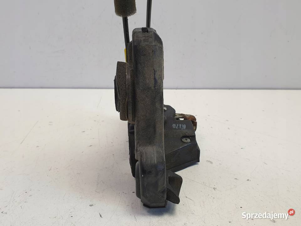 Corolla Verso II ZAMEK DRZWI Prawy przód Rudka