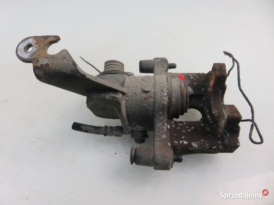 ZACISK LEWY TYŁ NISSAN PRIMERA P12 osobowe