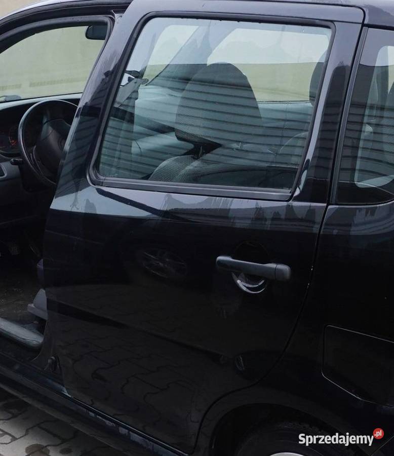 DRZWI LEWY TYŁ DAIHATSU YRV M200 Nowy Tomyśl