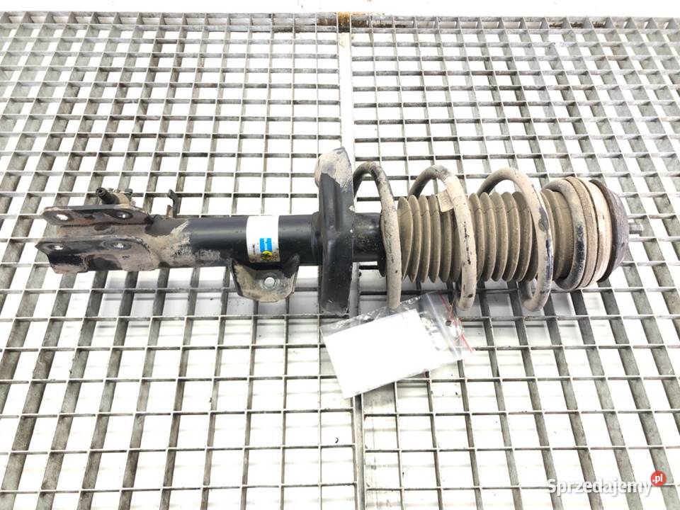 AMORTYZATOR LEWY PRZÓD ZE SPRĘŻYNĄ OPEL CORSA E osobowe podkarpackie