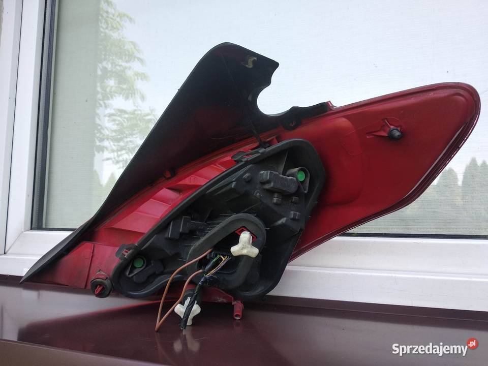 Peugeot 308 T7 hatchback lampa tył tylna lewa Sieradz