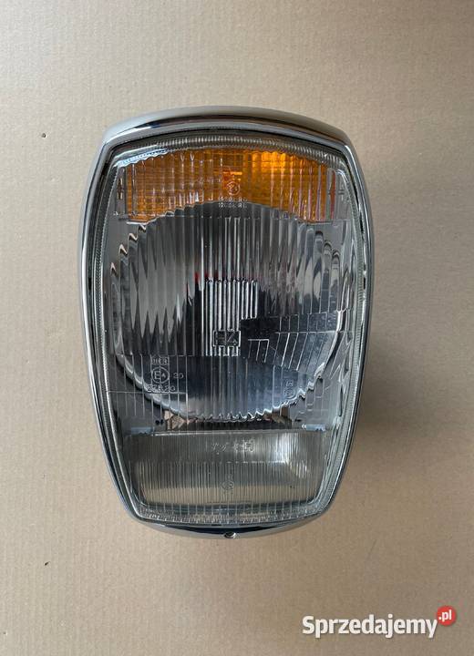Mercedes Benz W114 W115 reflektor lampa przedni osobowe Poznań