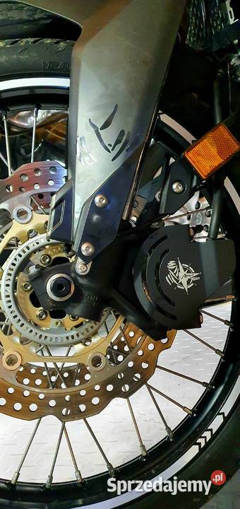 Raising the front wheel fender Mielec