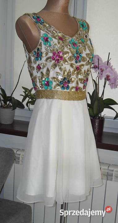kremowa sukienka cekiny 12 L m sprzedam