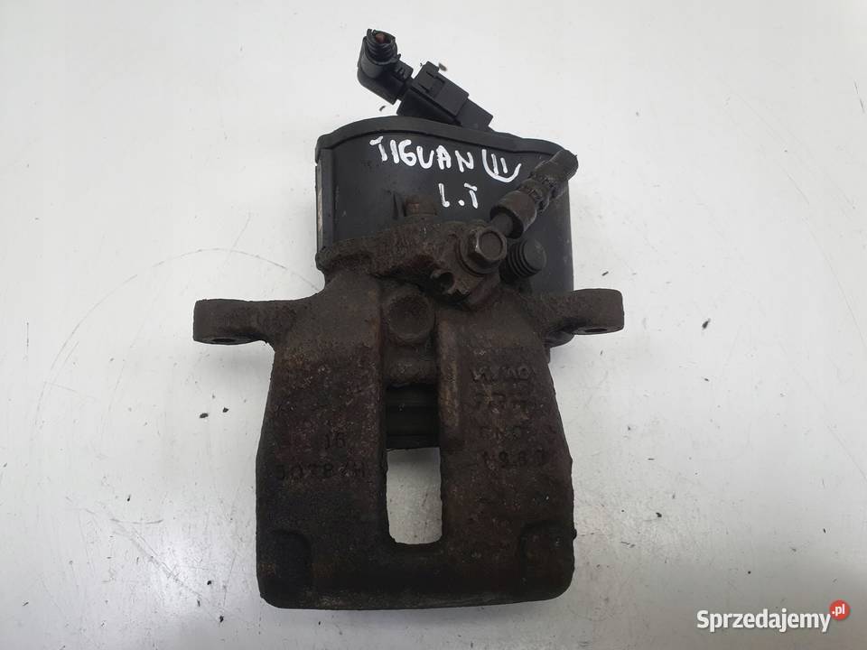 VW Tiguan TYLNY ZACISK HAMULCOWY lewy tył