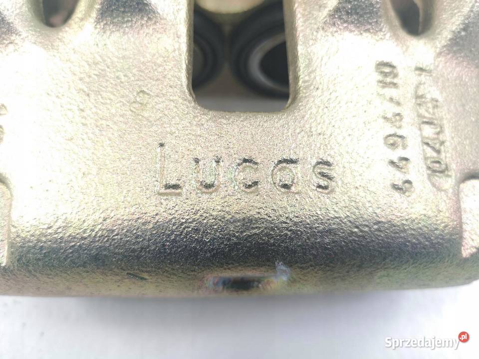 ZACISK HAMULCOWY PRAWY PRZÓD FIAT DUCATO 9402