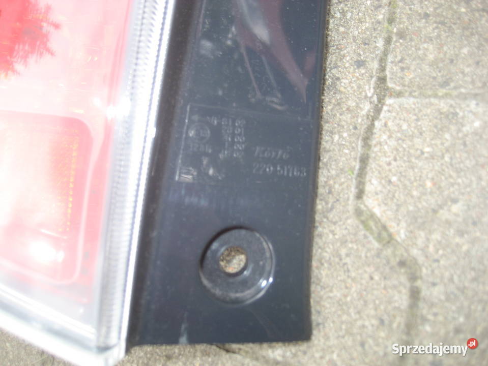 daihatsu sirion II 0510r lampa tył lewa koito