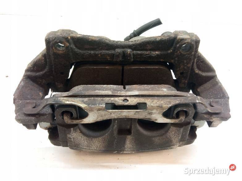 ZACISK HAMULCOWY LEWY PRZÓD 20 TDCI E1GC2010LD osobowe