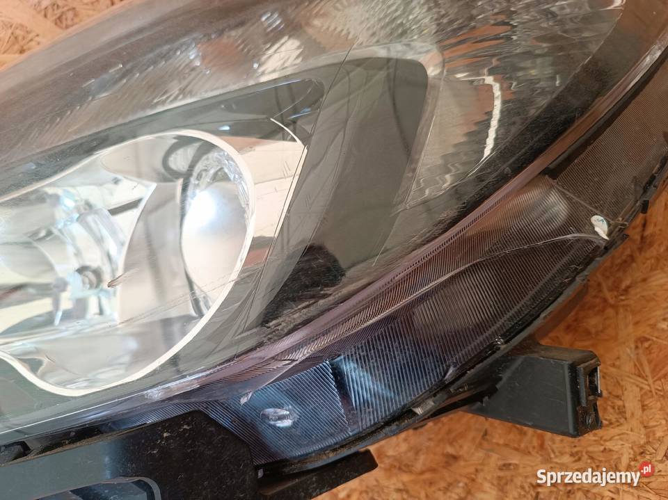 LAMPA LEWY PRZÓD REFLEKTOR EU XENON OPEL MOKKA osobowe wielkopolskie Nowy Tomyśl