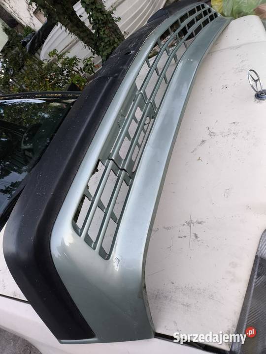 Mercedes W124 zderzak przedni szeroka listwa z