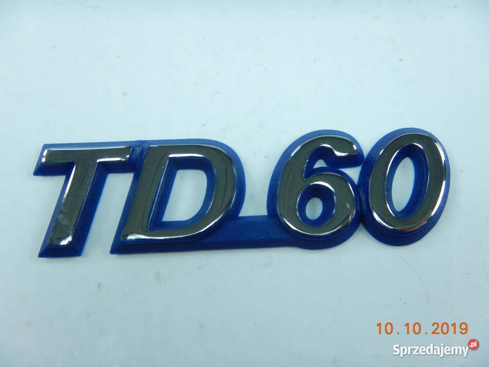 EMBLEMAT BŁOTNIKA FIAT PUNTO 9399 TD 60 46462013
