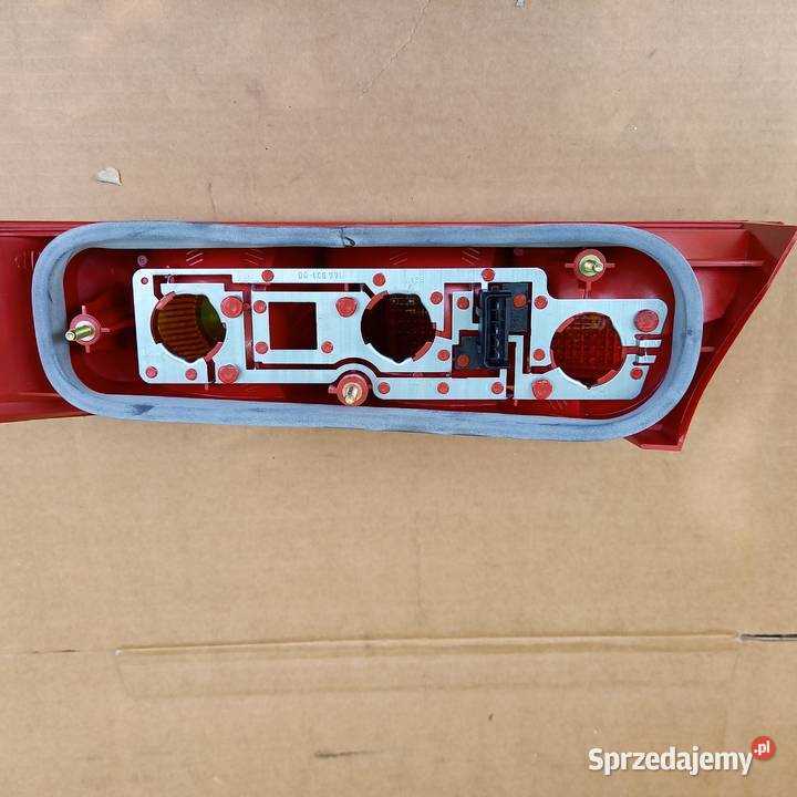 105915097GX13405AA Lampa tył strona lewa SCORPIO Oświetlenie Kraków