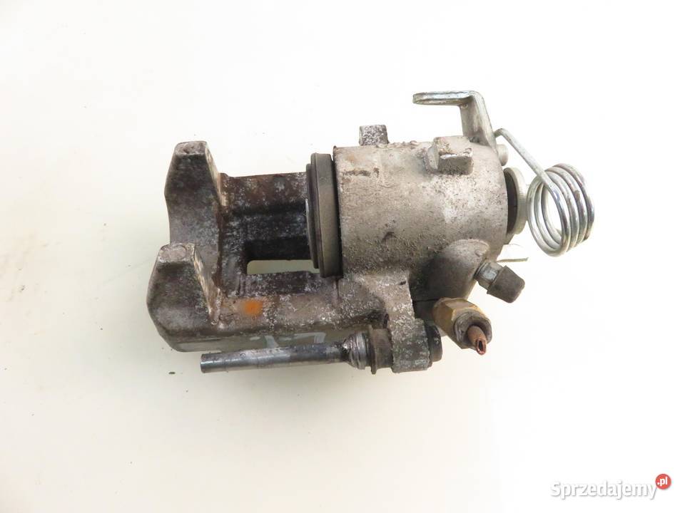 ZACISK LEWY TYŁ SEAT TOLEDO II 1M2 18 20V 125