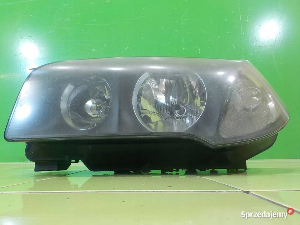 BMW X3 E83 30 B 04r 5D lampa lewa przod osobowe Suków